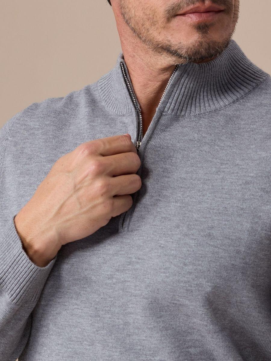 Pull en maille zippé demi-longueur boucles